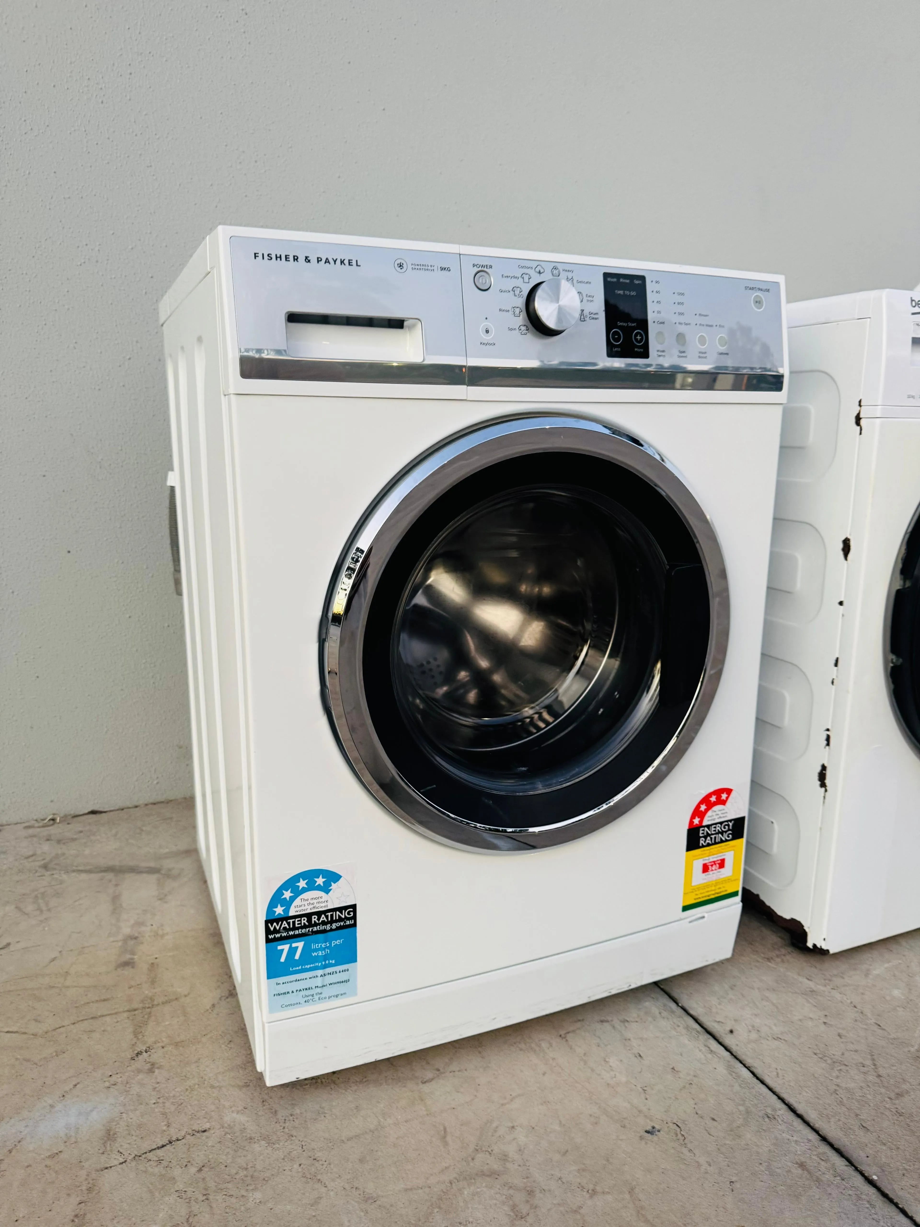 **FISHER & PAYKEL 9KGS FRONT LOADER WASHING MACHINE**