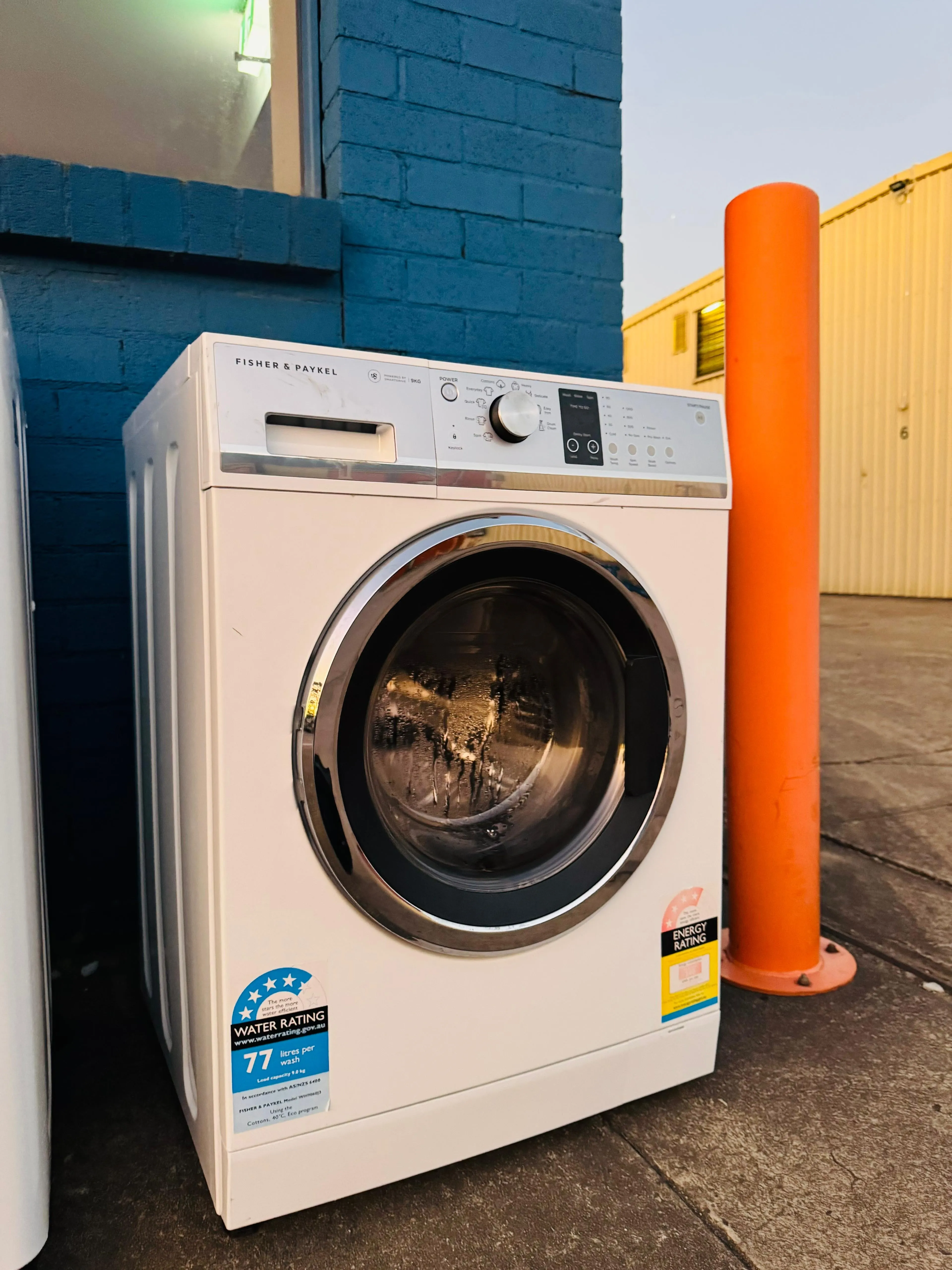 **FISHER & PAYKEL 9KGS FRONT LOADER WASHING MACHINE**