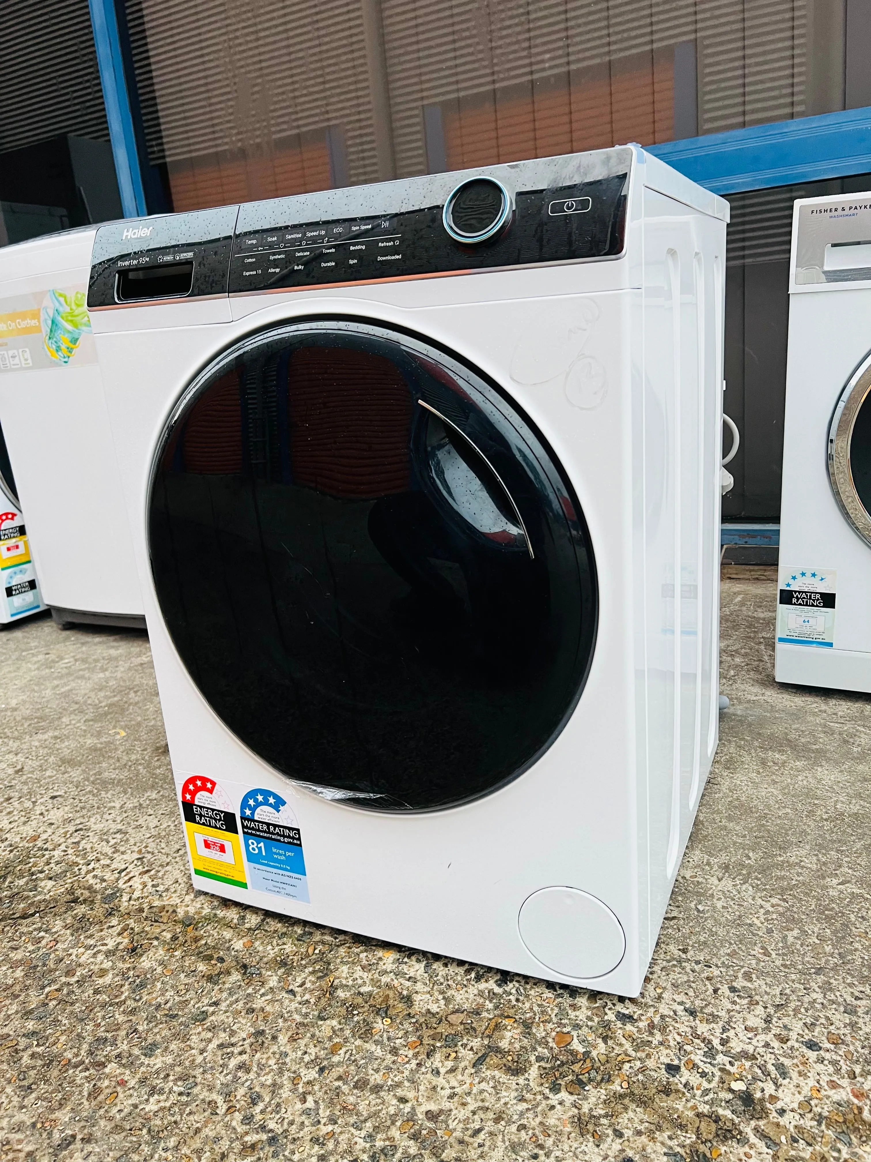 **HAIER 9.5 KGS FRONT LOADER WASHING MACHINE**