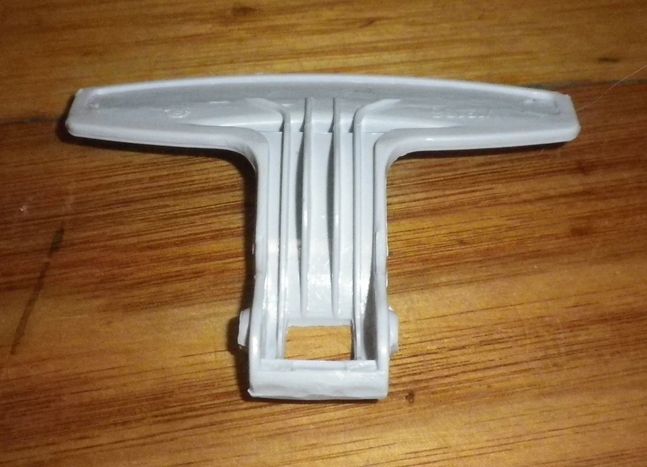 Haier HWM1070KFL, HWM1270KFL Front Loader Door Handle Lever - Part # H0020202095