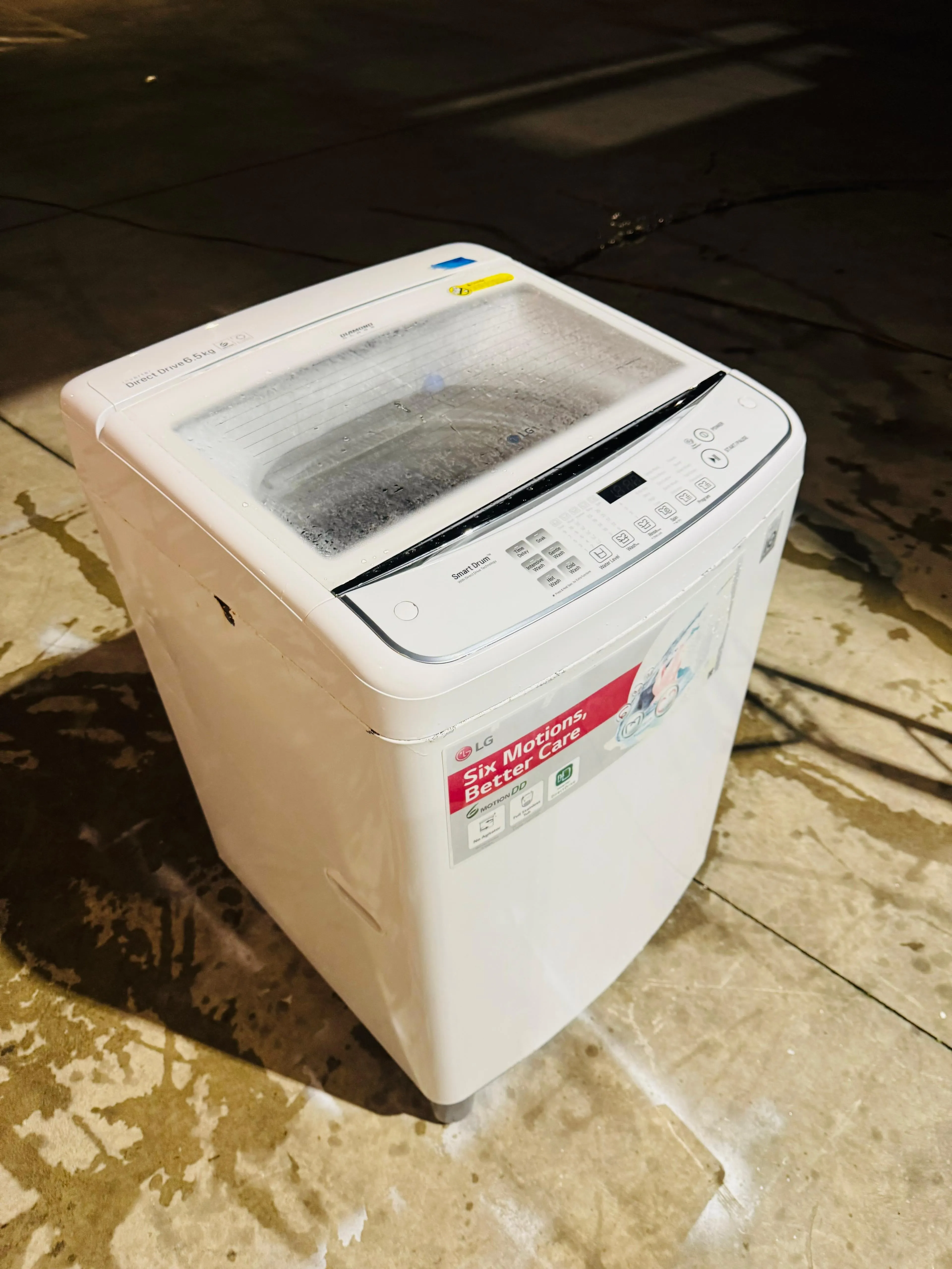 **LG 6.5 KGS TOP LOADER WASHING MACHINE**