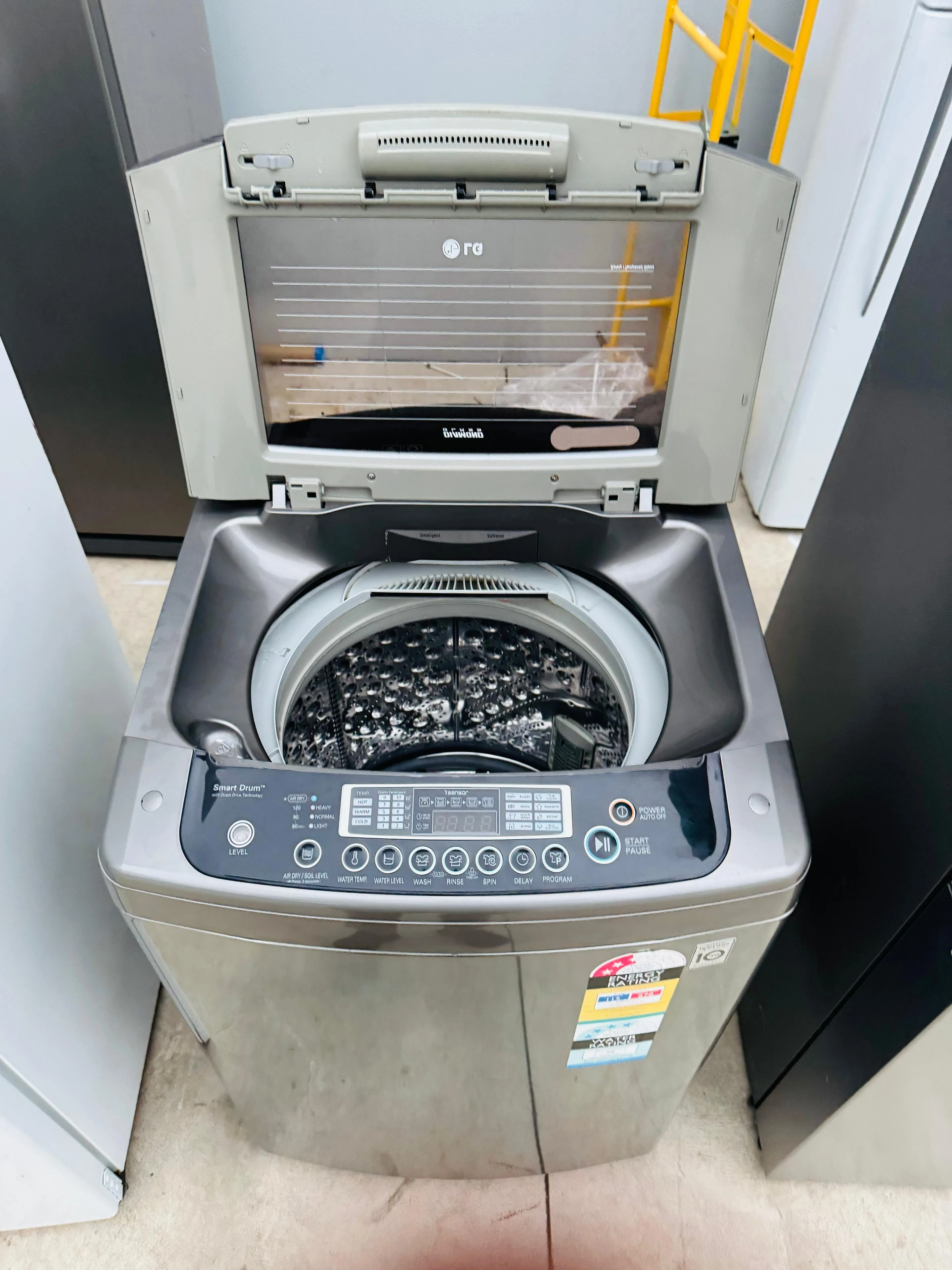 **LG 9.5KGS TOP LOADER WASHING MACHINE**