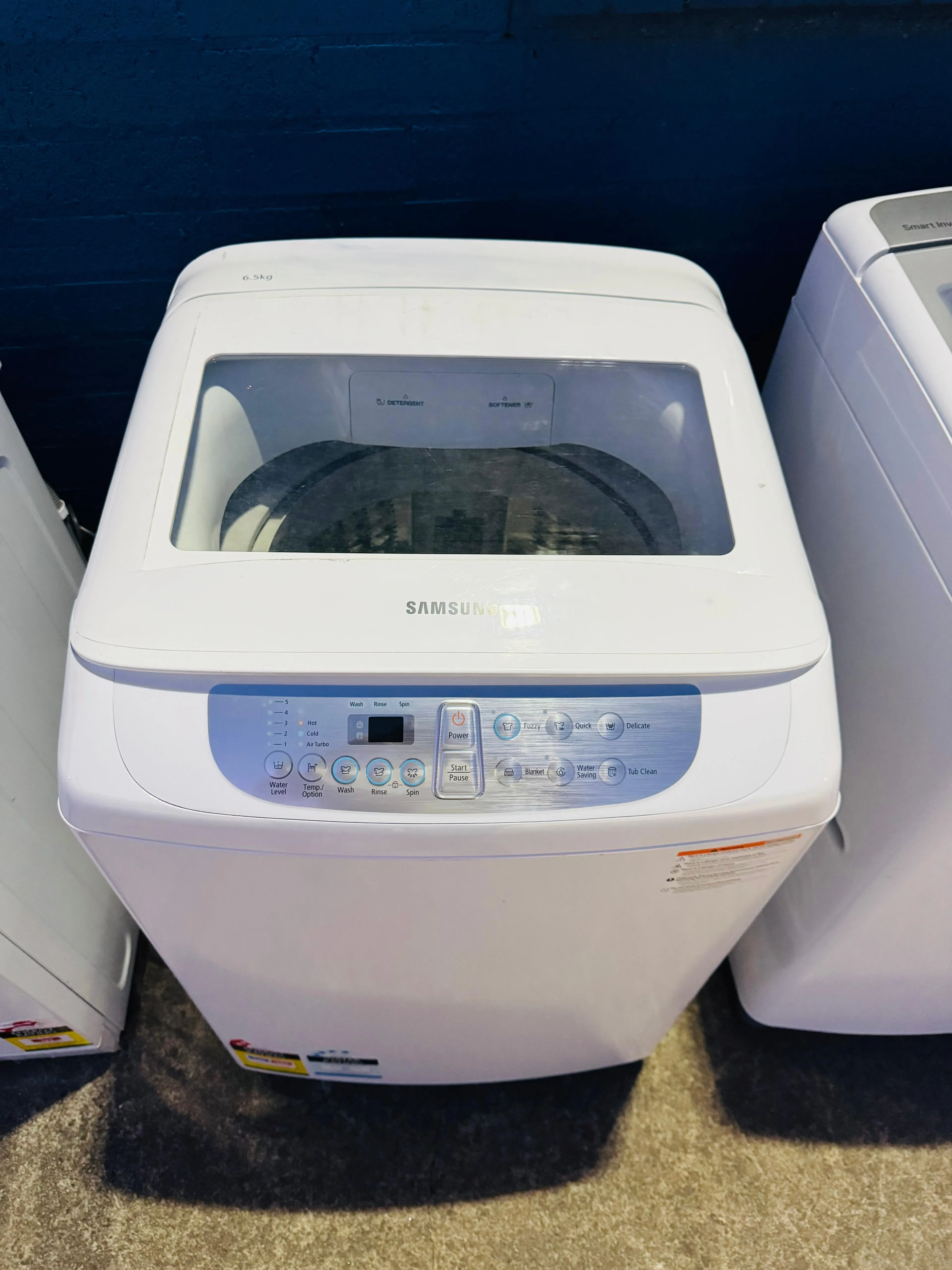 **SAMSUNG 6.5 KGS TOPLOADER WASHING MACHINE**